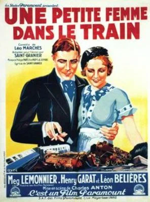 Постер: Une petite femme dans le train