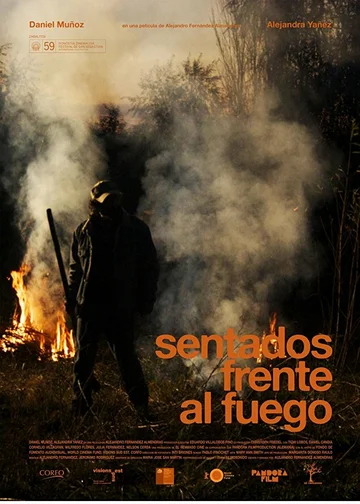 Постер: Sentados frente al fuego